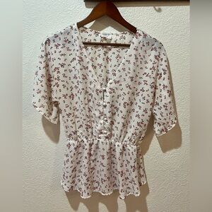 White blouse with pink flowers